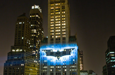 Bat-signal projected onto building in Manhattan